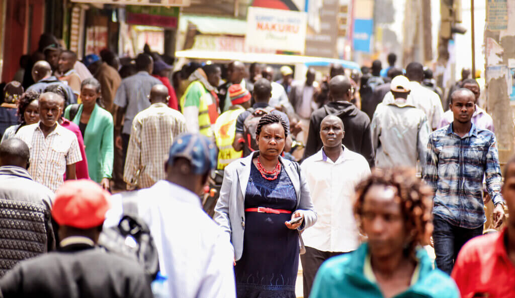 People walking along a busy street in the crowded downtown  of Nairobi City, Kenya, East Africa